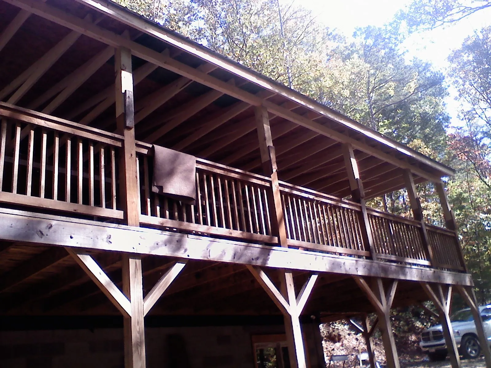 Timber framing under a new elevated porch and deck — Roof Leak Repair in White Salmon by Roofing Brothers